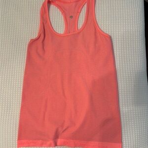 Lulu Lemon Athletic peachy pink  tank . Excellent condition . Size 6